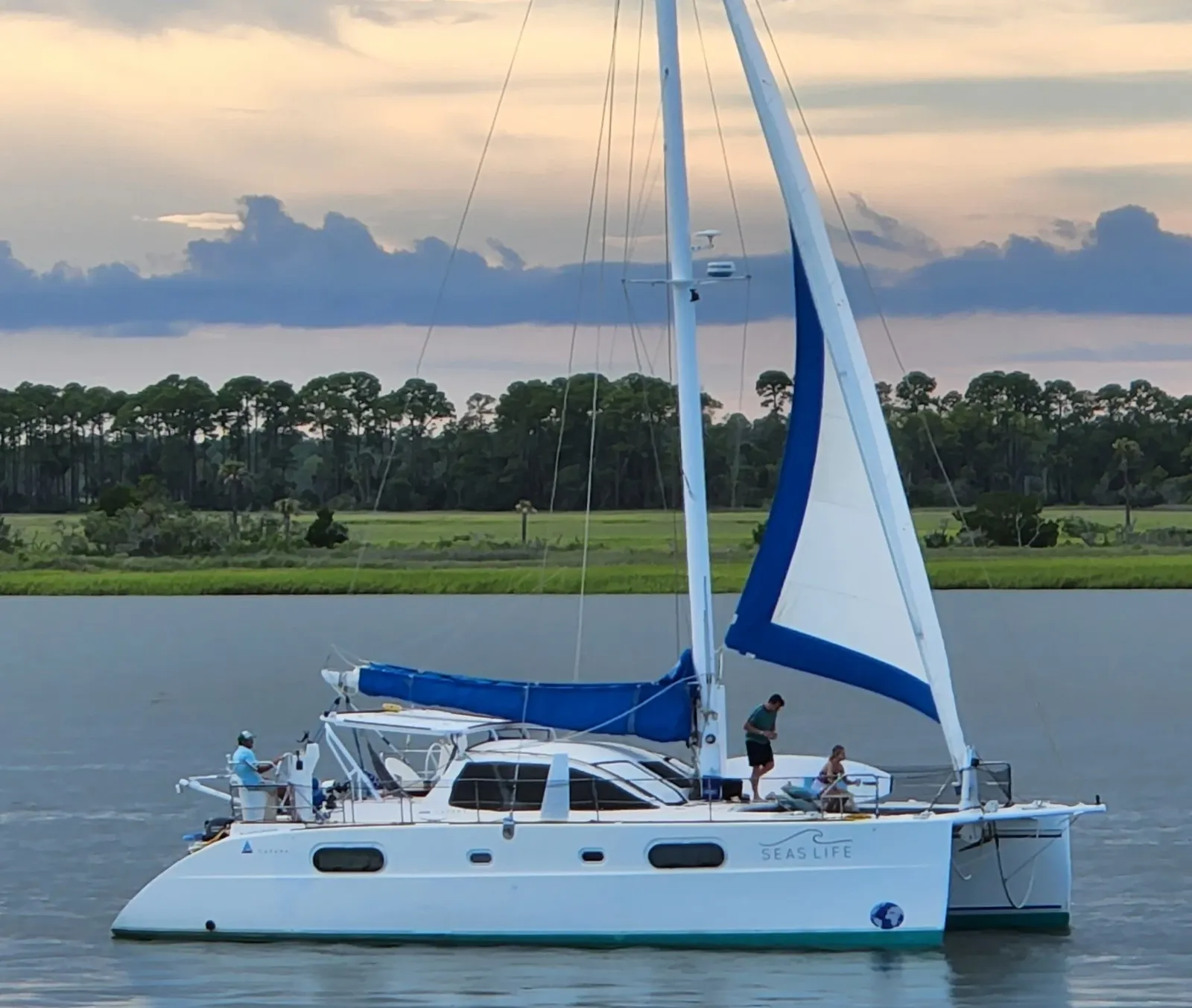 Captain Ryan's sailing catamaran under sail near Folly Beach